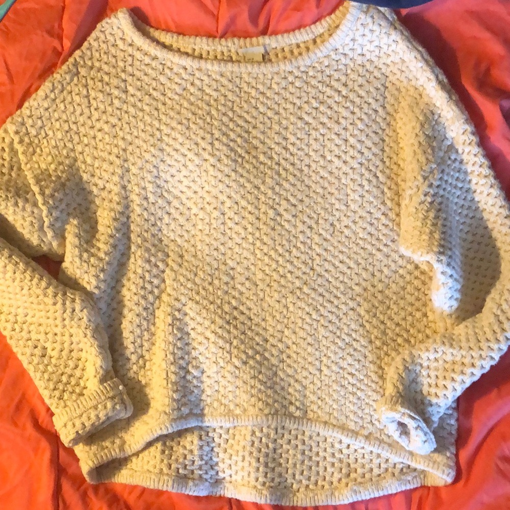White sweater.